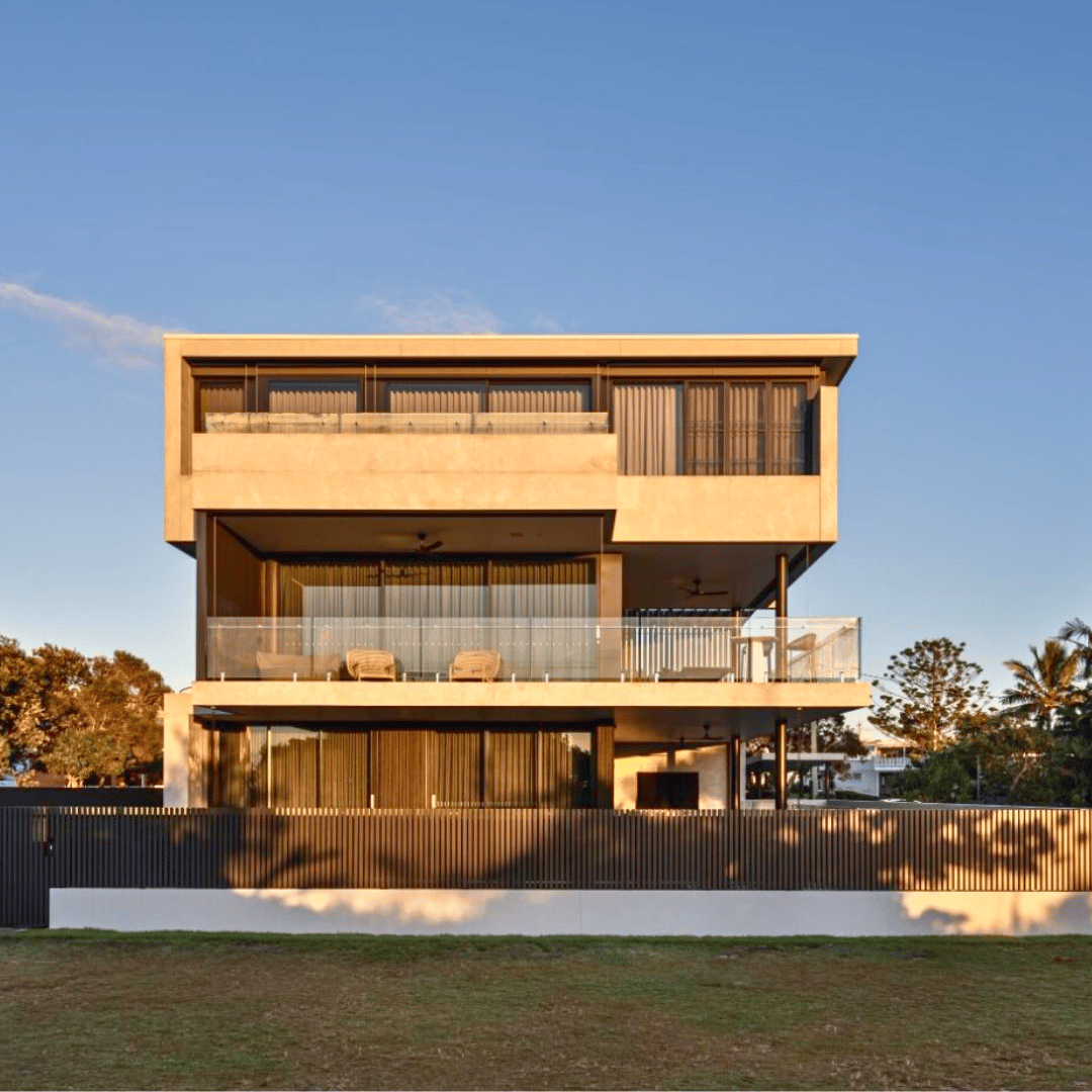 Coastal Cabarita Beach Northern NSW home with a textured facade of recycled brick, timber, and lush native landscaping by CREATE Architecture.