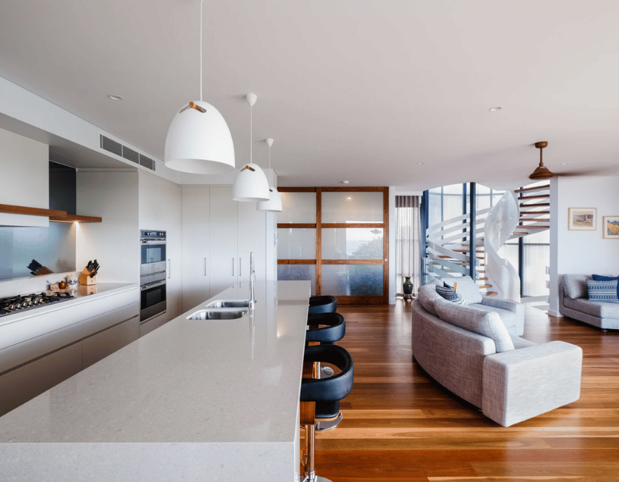 Chef's kitchen with stone island bench and custom cabinetry in a Northern NSW architect-designed residence.