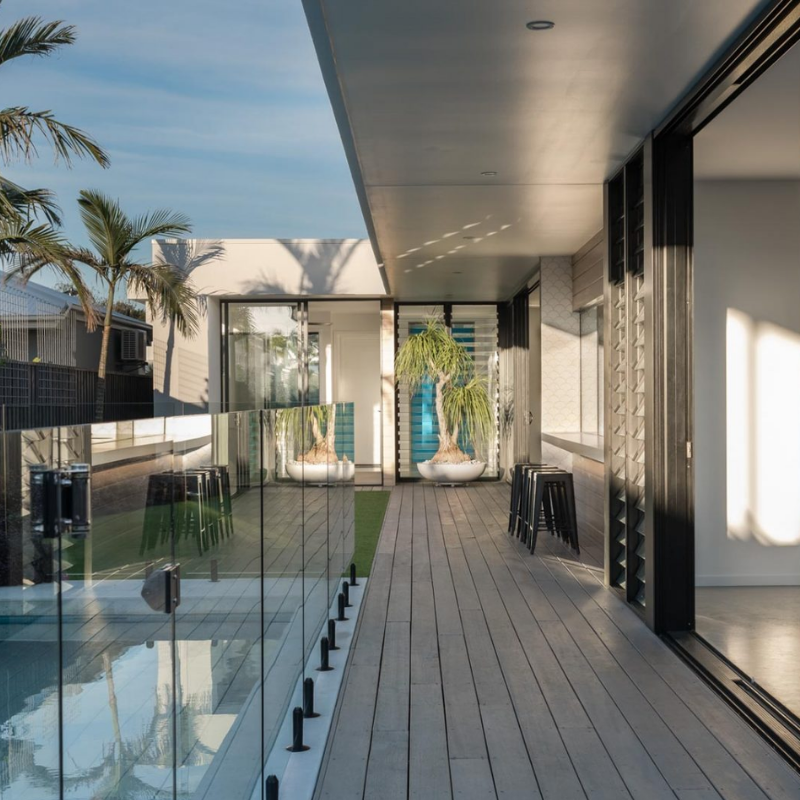 Contemporary residential extension designed by an architect in Cabarita Beach, featuring a light-filled kitchen, double-height space, timber finishes and modern detailin